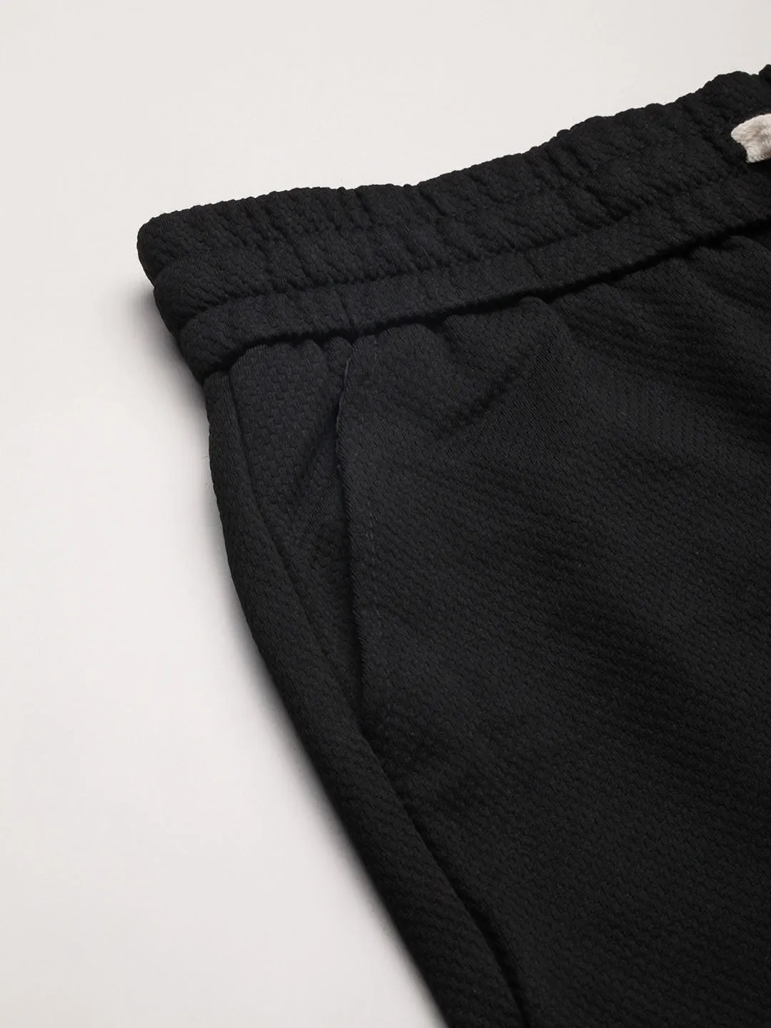 Men Black Solid Mid-Rise Shorts